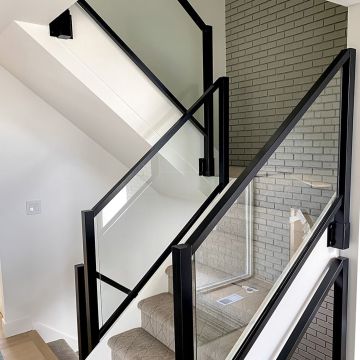 Extend Skyline Framed Glass Railing down your stairs with specially-designed stair rail kits